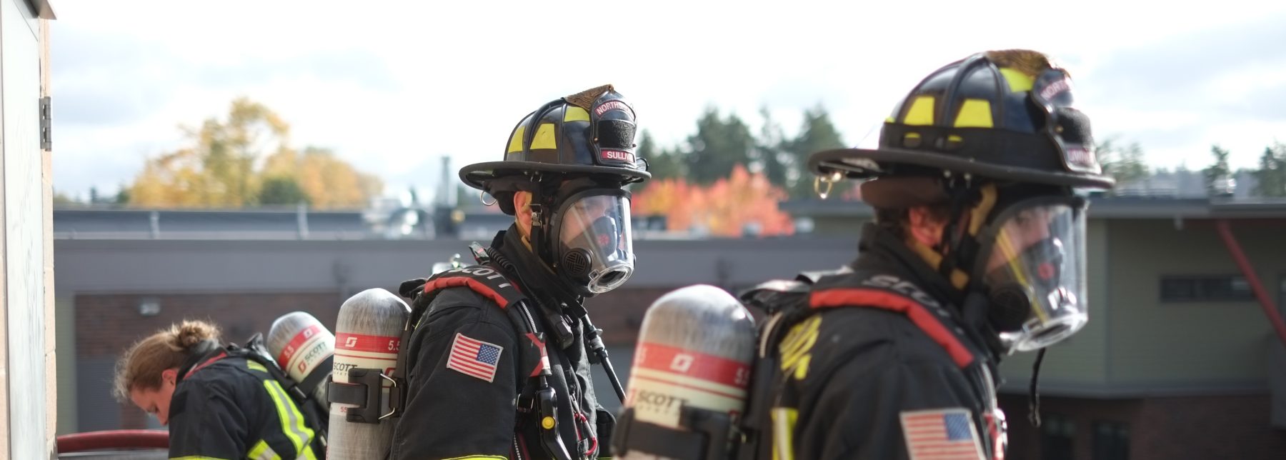 Northshore Firefighters wearing oxygen tanks