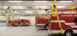 Northshore Fire engines inside garage