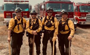Four Firefighters with axes